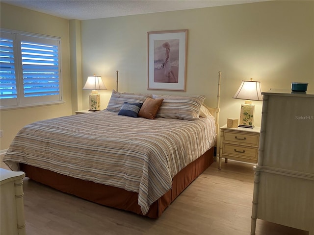 bedroom featuring light wood-type flooring