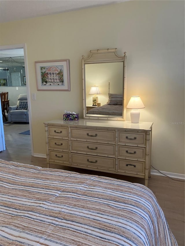 bedroom with light wood-type flooring