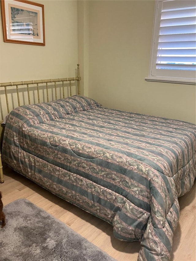 bedroom featuring light wood-type flooring