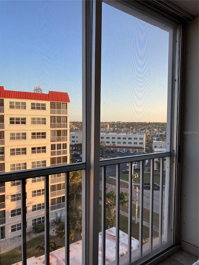 view of balcony at dusk