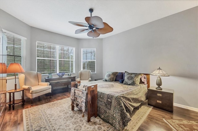 bedroom featuring hardwood / wood-style floors and ceiling fan