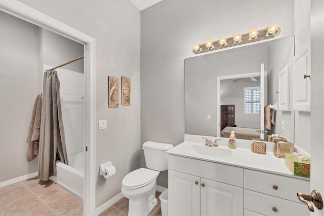 full bathroom with tile patterned floors, shower / bath combo with shower curtain, vanity, and toilet