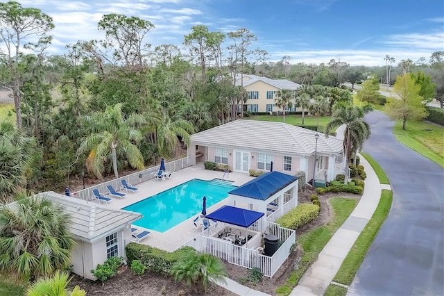 view of swimming pool with a patio