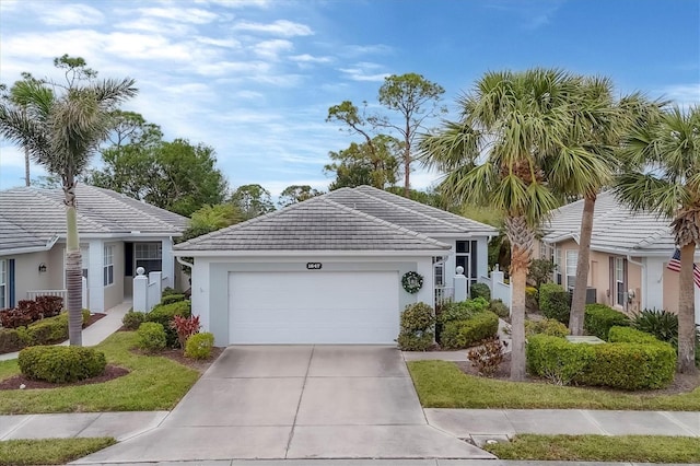 view of front of property with a garage