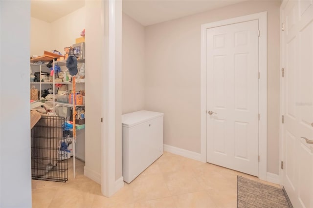 interior space featuring light tile patterned flooring