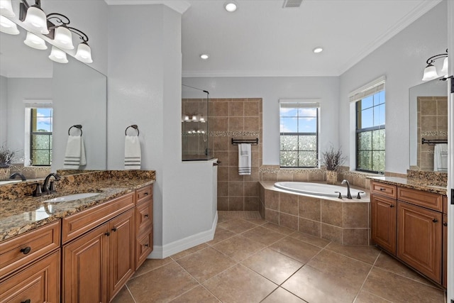 bathroom featuring plus walk in shower, ornamental molding, tile patterned flooring, and vanity