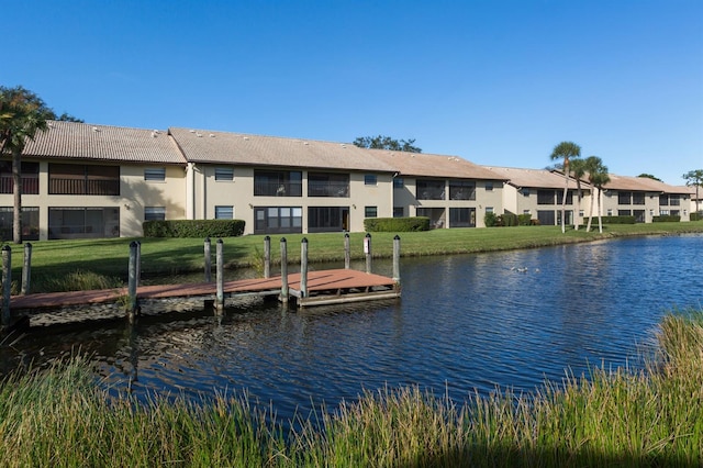 property view of water featuring a boat dock