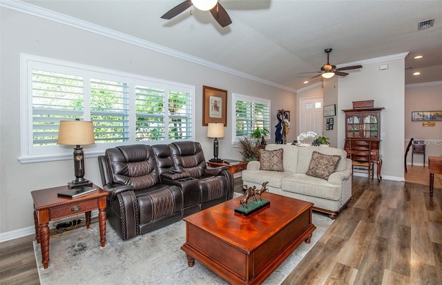 living room featuring crown molding, ceiling fan, lofted ceiling, and wood-type flooring