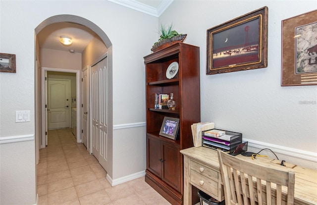 corridor with crown molding and light tile patterned flooring