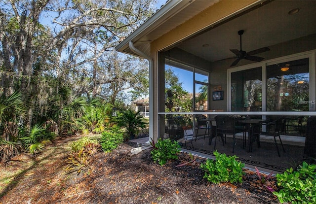 view of yard featuring ceiling fan