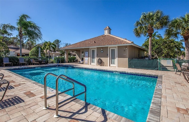 view of swimming pool featuring a patio