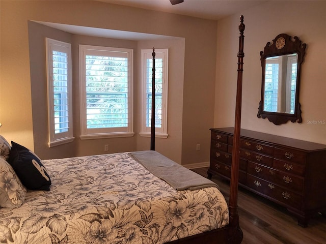 201 Auburn Woods Cir, Venice, FL 34292 - bedroom with wood finished floors and multiple windows