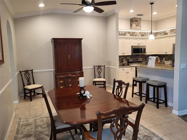 201 Auburn Woods Cir, Venice, FL 34292 - dining area with ceiling fan, light tile patterned floors, ornamental molding, and recessed lighting