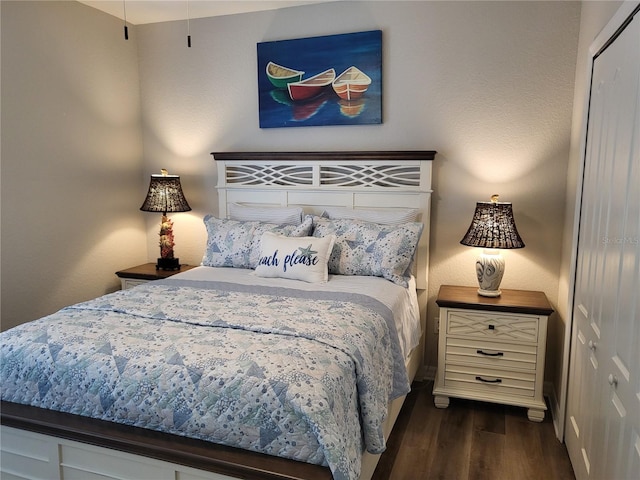 201 Auburn Woods Cir, Venice, FL 34292 - bedroom with a closet and wood finished floors