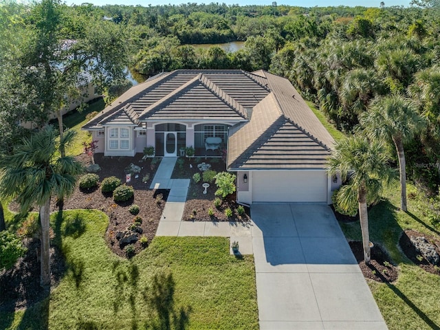 single story home featuring a garage