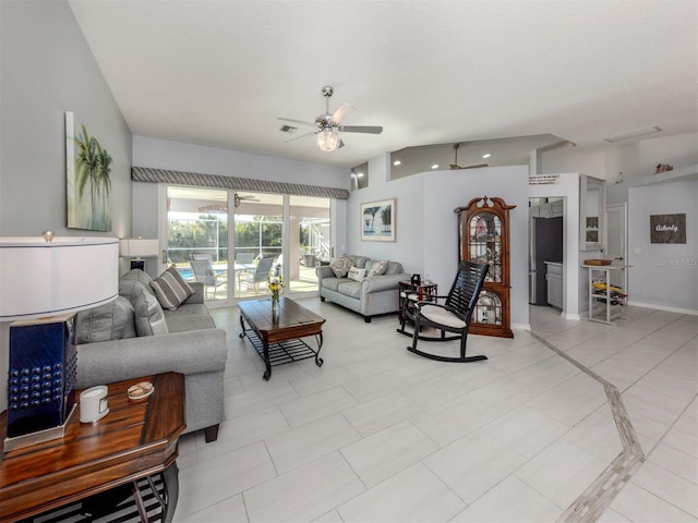 living room featuring light tile patterned floors and ceiling fan