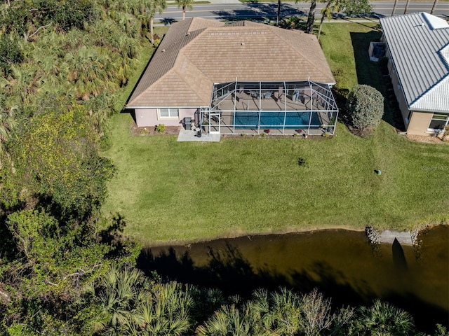 drone / aerial view with a water view