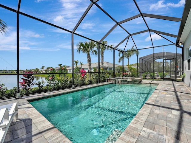 view of swimming pool with an in ground hot tub, a lanai, a water view, and a patio area