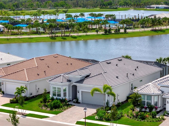 bird's eye view with a water view