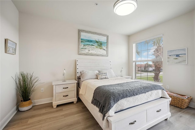 bedroom with light hardwood / wood-style flooring