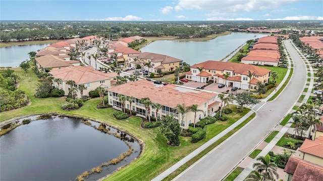 drone / aerial view with a water view