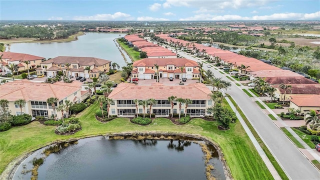 drone / aerial view with a water view