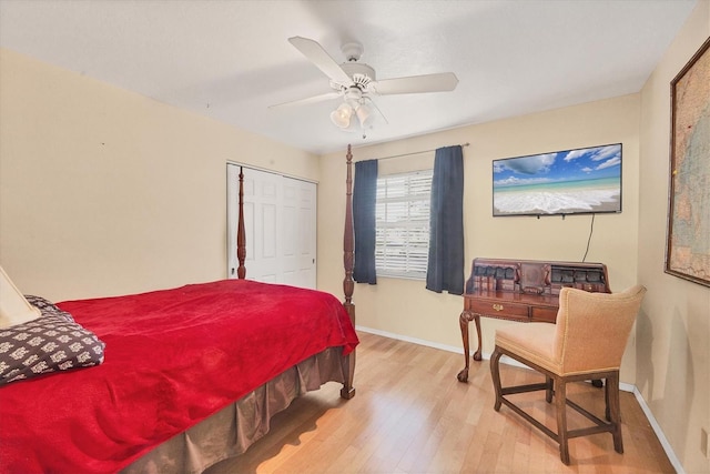 bedroom featuring ceiling fan, a closet, and light hardwood / wood-style flooring