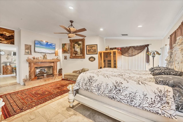 bedroom featuring vaulted ceiling, ceiling fan, and crown molding