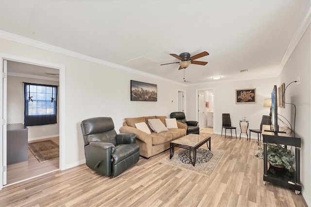 living room with ceiling fan, ornamental molding, and light hardwood / wood-style floors