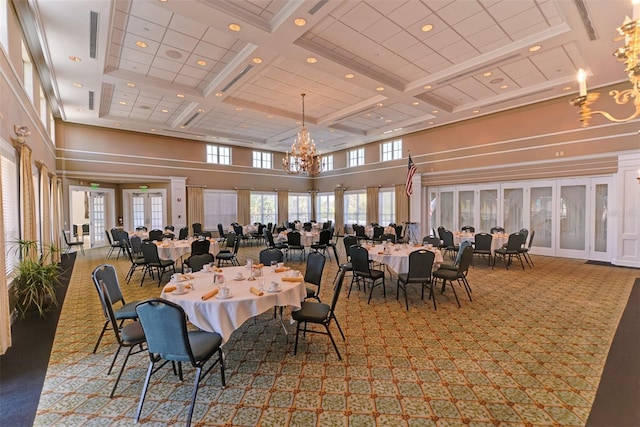 carpeted dining space with beamed ceiling, a towering ceiling, an inviting chandelier, and coffered ceiling