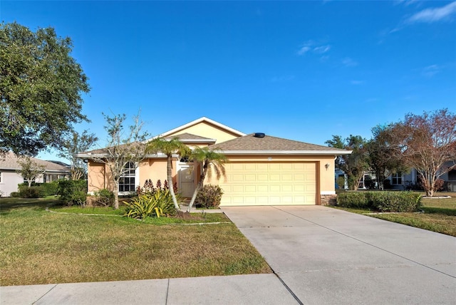 ranch-style home with a garage and a front lawn