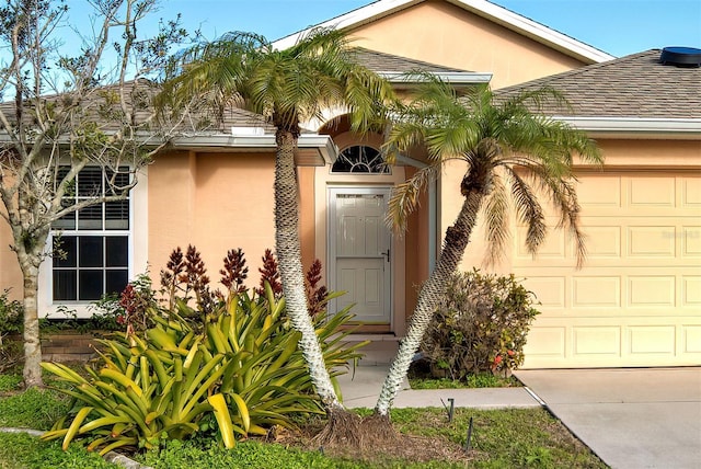 property entrance with a garage