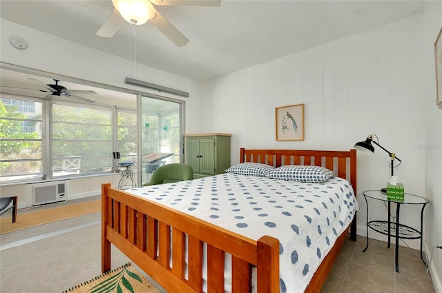 bedroom with ceiling fan and tile patterned floors