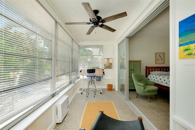 home office with light tile patterned floors, ornamental molding, a wall mounted AC, and ceiling fan