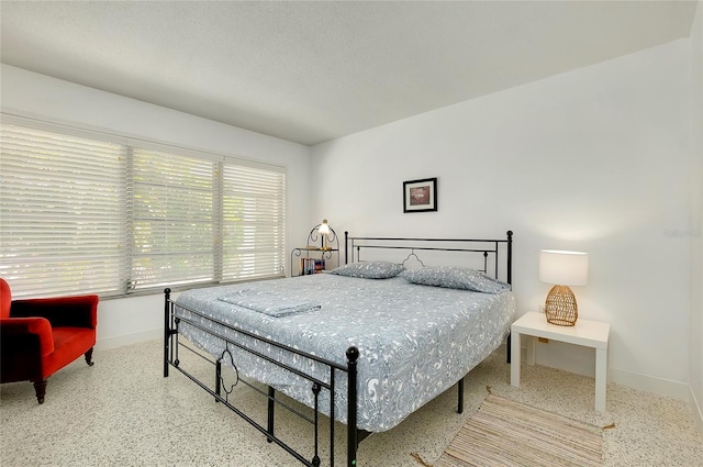 bedroom featuring a textured ceiling