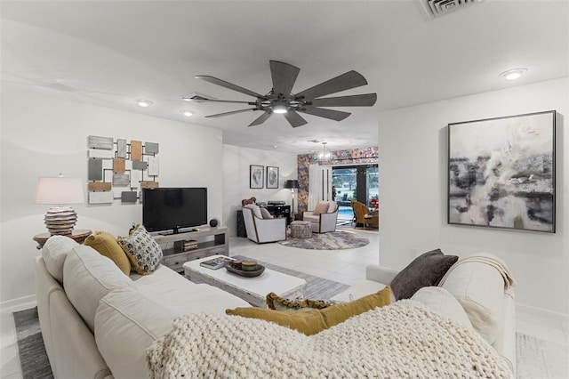 tiled living room featuring ceiling fan