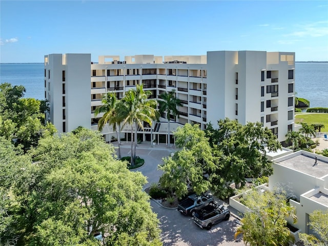 view of building exterior with a water view