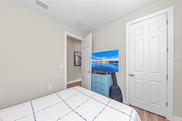 bedroom featuring light hardwood / wood-style flooring