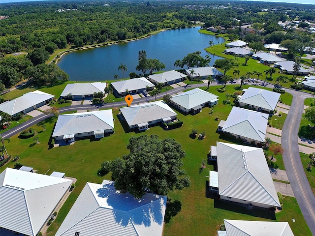 bird's eye view with a water view