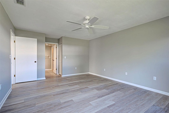 unfurnished bedroom with ceiling fan and light hardwood / wood-style floors