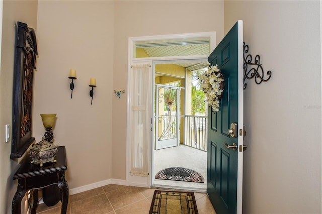 foyer featuring light tile patterned flooring