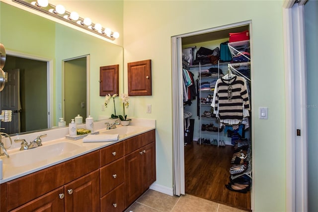 bathroom with vanity and tile patterned floors