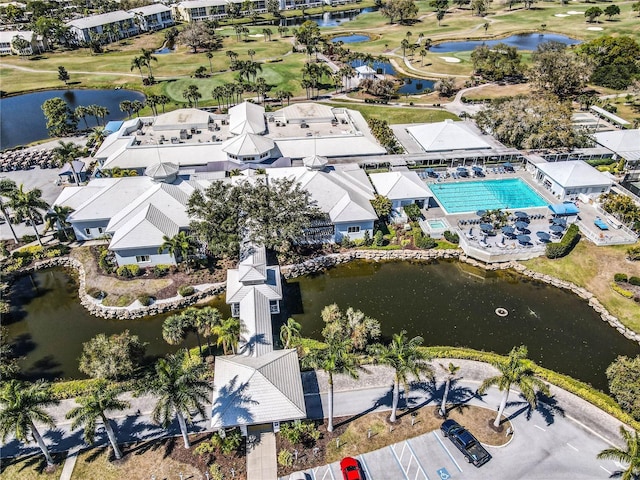 drone / aerial view with a water view