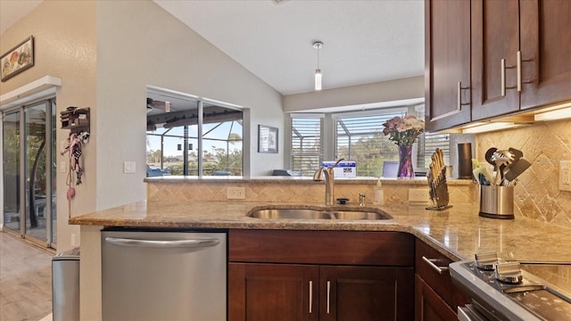 kitchen featuring sink, vaulted ceiling, dishwasher, range, and light stone countertops