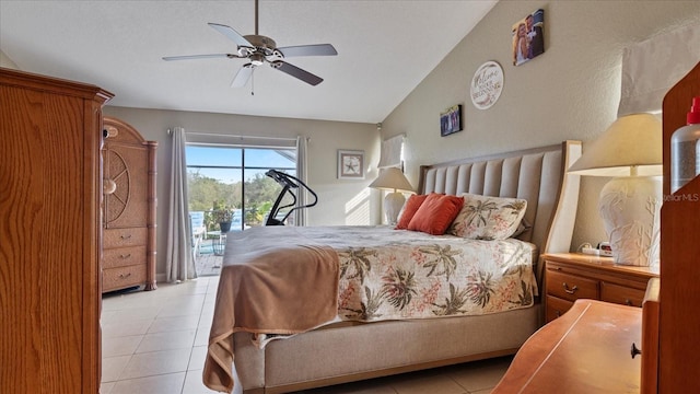 tiled bedroom featuring access to outside, ceiling fan, and lofted ceiling