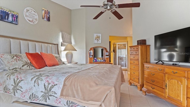 bedroom with light tile patterned flooring and ceiling fan