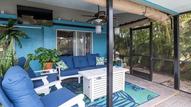 view of patio / terrace with ceiling fan and an outdoor hangout area