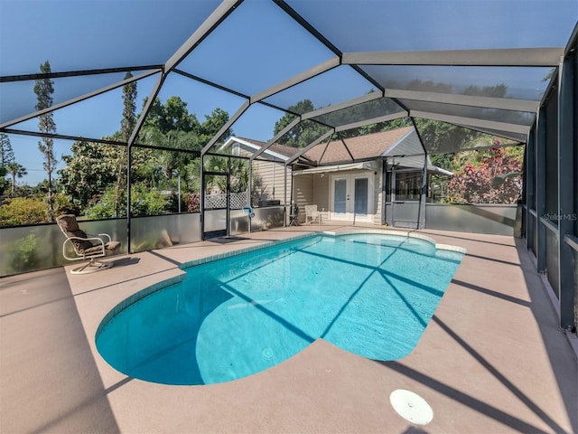 601 E Seminole Dr, Venice, FL 34293 - view of swimming pool with a lanai, a patio area, and french doors