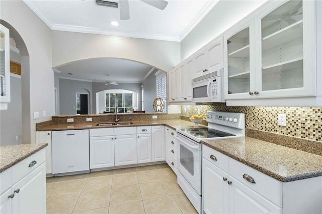 kitchen featuring white cabinetry, sink, ceiling fan, and white appliances