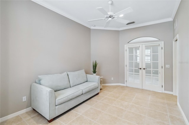 sitting room featuring crown molding, light tile patterned floors, ceiling fan, and french doors